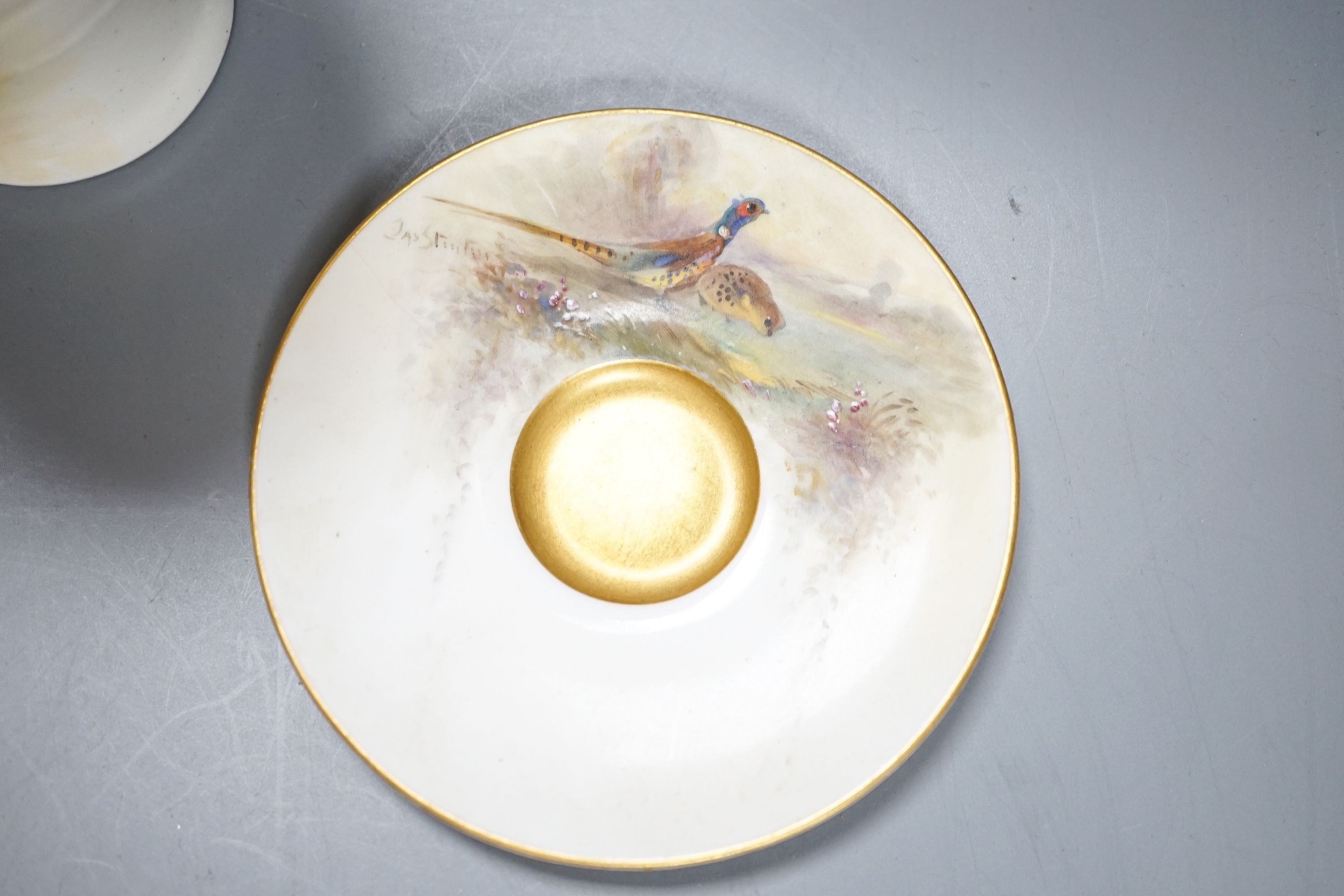 A Royal Worcester fruit painted small pot pourri and cover, 10.9cm high and a similar vase, 15cm, a Royal Worcester miniature cup and saucer, painted with pheasants, signed James Stinton and Grainger & Co pheasant vase